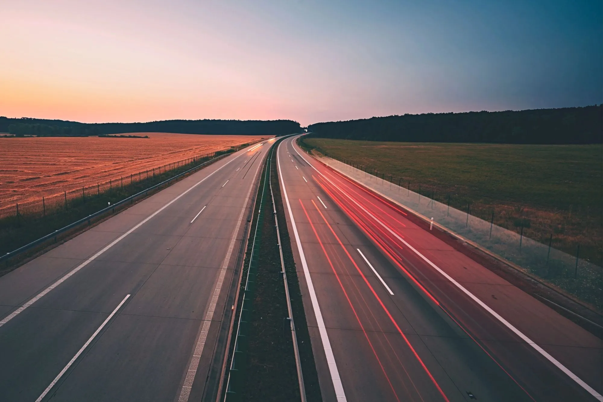 Highway light trails at sunset — LMM Engineering, traffic consultants since 2007